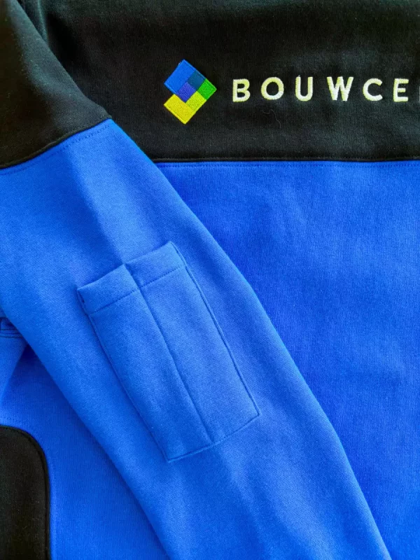Blauwe werkkleding met Bouwcenter-logo